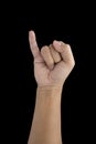 Man making a pinkie symbol of promise isolated on black