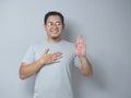 Man Making Pledge Gesture, Hand on Chest, Making Promise Royalty Free Stock Photo