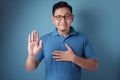 Man Making Pledge Gesture, Hand on Chest, Making Promise