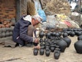 Man making pottery