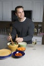 Man making salad.