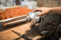 Man making sausages the traditional way using sausage filler. Royalty Free Stock Photo