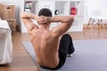 Man making sit-ups Royalty Free Stock Photo