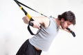 Man making suspension training