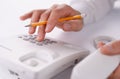 Man making a telephone call on a landline Royalty Free Stock Photo