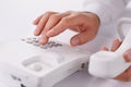 Man making a telephone call on a landline Royalty Free Stock Photo