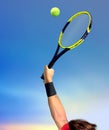 Man Making a Tennis Serve Royalty Free Stock Photo