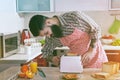 man making toasts with toaster