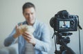 Man making video blog about money earning. Royalty Free Stock Photo