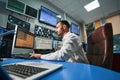 Man managing network of data center from computer Royalty Free Stock Photo