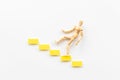 Man mannequin figure falling down from stairs. Accident failure and fiasco in business concept Royalty Free Stock Photo