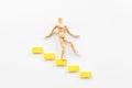 Man mannequin figure falling down from stairs. Accident failure and fiasco in business concept Royalty Free Stock Photo