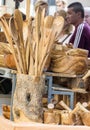 Man in a market of antique spoons Royalty Free Stock Photo