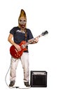 Man in mask of angry corn and casual clothing playing electric guitar isolated on white background. Masked Musician playing the