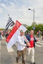 Man with mask and flag at protest