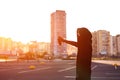 Guy with spray can in hand. Graffiti drawing. Sunlight Royalty Free Stock Photo