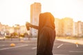 Guy with spray can in hand. Graffiti drawing. Sunlight Royalty Free Stock Photo