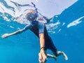 Man with mask snorkeling in clear water Royalty Free Stock Photo