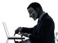 Man masked anonymous group member computing computer silhouette Royalty Free Stock Photo