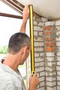 Man measures window Royalty Free Stock Photo