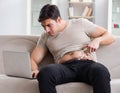 Man measuring body fat with calipers Royalty Free Stock Photo