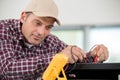man measuring voltage machine Royalty Free Stock Photo
