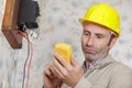 man measuring voltage Royalty Free Stock Photo