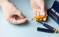 A man in medical gloves holds a syringe for subcutaneous injection of hormonal drugs in the IVF protocol in vitro fertilization Pr Royalty Free Stock Photo