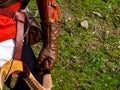 man in medieval dress with hand with leather glove holding a composite bow Royalty Free Stock Photo