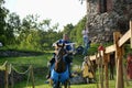 Man in a medieval historical clothes on horseback Royalty Free Stock Photo