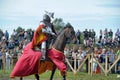 Man in a medieval historical clothes on horseback Royalty Free Stock Photo