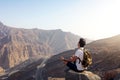 Man meditating on the mountain top Royalty Free Stock Photo