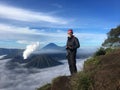 Man meets the sunrise at the Bromo Tengger Semeru National Park on the Java Island, Indonesia Royalty Free Stock Photo