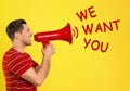 Man with megaphone and phrase WE WANT YOU on background. Career promotion