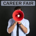 Man with megaphone and words CAREER FAIR on background