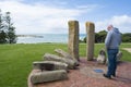 Man at memorial to mark the site of the first harbourmaster's