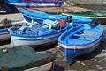 Man mending boat Boat Yard Aci Trezza Sicily Italy