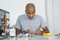 Man mending computer unit Royalty Free Stock Photo