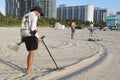 man with metal detector at Miami Beach