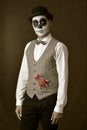 Man with mexican calaveras makeup and amputated hand Royalty Free Stock Photo