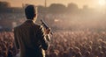 man with a microphone at a large outdoor event Royalty Free Stock Photo