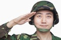 Man in military uniform saluting Royalty Free Stock Photo