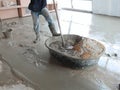 Man Mixing Cement