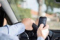 Man with mobile and driving