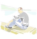 Man with mobile phone sitting on the parapet