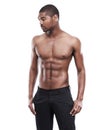 Man, model and shirtless for fitness, six pack and standing on white background, confident and abs. Studio backdrop, fit