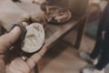 Man molding clay to make ceramics with his hands, Artisan working in his workshop, Selective Focus Royalty Free Stock Photo