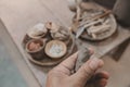 Man molding clay to make ceramics with his hands, Artisan working in his workshop, Selective Focus Royalty Free Stock Photo