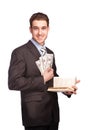 Man with money and book in suit Royalty Free Stock Photo