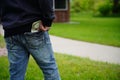 Man with money in pocket of jeans. dollars in pocket Royalty Free Stock Photo